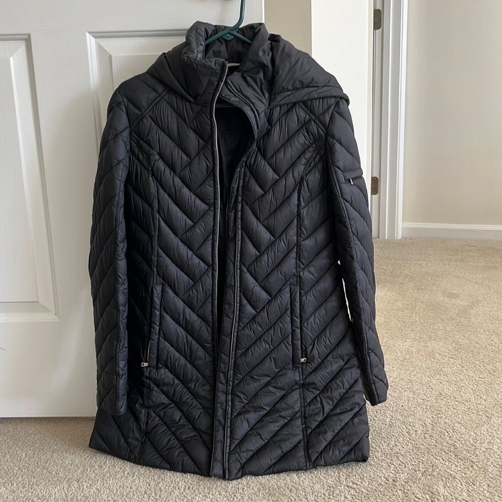 Black Nautica hooded parka. Size medium. Hits right above the knee.